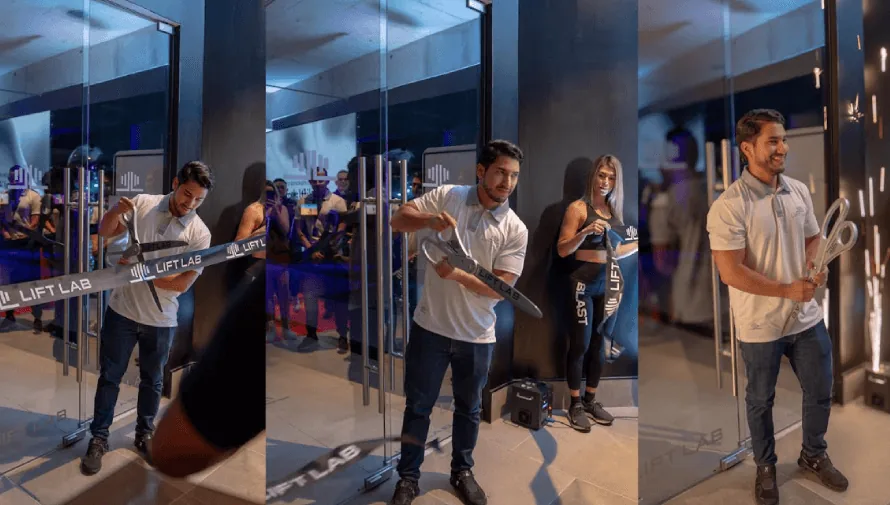 hombre cortando una cinta de inauguración